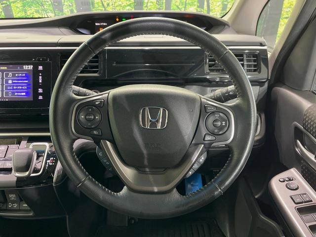 ステップワゴンスパーダ ｅ：ＨＥＶスパーダ　Ｇ　ホンダセンシング　メーカーナビ　後席モニター　全周囲カメラ　衝突軽減装置　レーダークルーズ　両側電動スライドドア　禁煙車　スマートキー　ＬＥＤヘッド　ＥＴＣ２．０　車線逸脱警報　デュアルオートエアコン（11枚目）