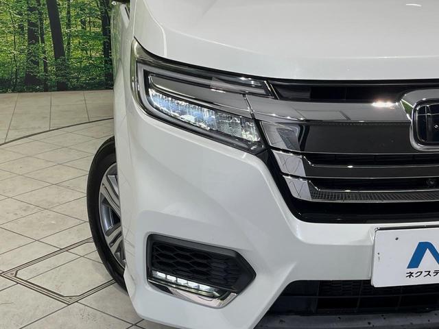 ステップワゴンスパーダ ｅ：ＨＥＶスパーダ　Ｇ　ホンダセンシング　メーカーナビ　後席モニター　全周囲カメラ　衝突軽減装置　レーダークルーズ　両側電動スライドドア　禁煙車　スマートキー　ＬＥＤヘッド　ＥＴＣ２．０　車線逸脱警報　デュアルオートエアコン（12枚目）