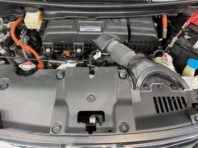 ステップワゴンスパーダ ｅ：ＨＥＶスパーダ　Ｇ　ホンダセンシング　メーカーナビ　後席モニター　全周囲カメラ　衝突軽減装置　レーダークルーズ　両側電動スライドドア　禁煙車　スマートキー　ＬＥＤヘッド　ＥＴＣ２．０　車線逸脱警報　デュアルオートエアコン（18枚目）