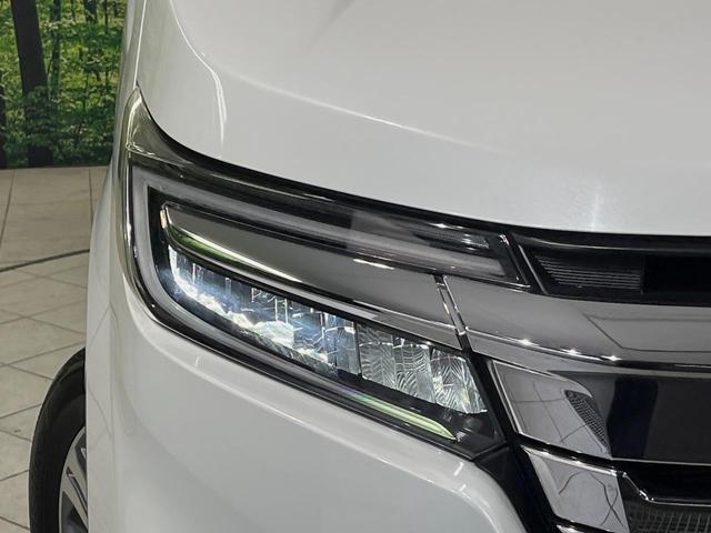 ステップワゴンスパーダ ｅ：ＨＥＶスパーダ　Ｇ　ホンダセンシング　メーカーナビ　後席モニター　全周囲カメラ　衝突軽減装置　レーダークルーズ　両側電動スライドドア　禁煙車　スマートキー　ＬＥＤヘッド　ＥＴＣ２．０　車線逸脱警報　デュアルオートエアコン（61枚目）