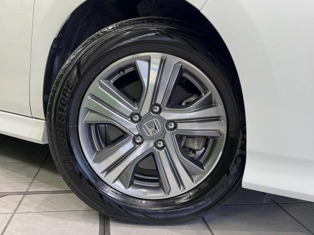 ステップワゴンスパーダ ｅ：ＨＥＶスパーダ　Ｇ　ホンダセンシング　メーカーナビ　後席モニター　全周囲カメラ　衝突軽減装置　レーダークルーズ　両側電動スライドドア　禁煙車　スマートキー　ＬＥＤヘッド　ＥＴＣ２．０　車線逸脱警報　デュアルオートエアコン（65枚目）