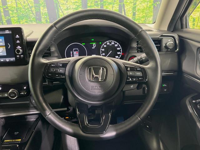 ヴェゼル ｅ：ＨＥＶ　Ｚ　メーカー９型ナビ　バックカメラ　衝突軽減装置　レーダークルーズ　禁煙車　パワーバックドア　シートヒーター　ハーフレザーシート　ドラレコ　コーナーセンサー　スマートキー　ＬＥＤヘッドライト　ＥＴＣ２．０（11枚目）