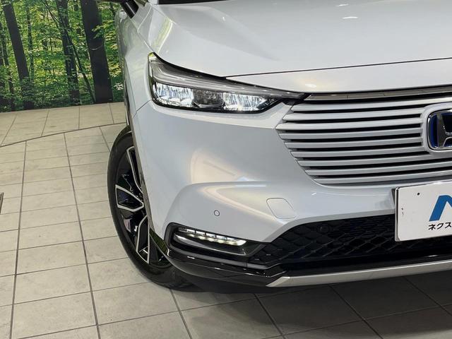 ヴェゼル ｅ：ＨＥＶ　Ｚ　メーカー９型ナビ　バックカメラ　衝突軽減装置　レーダークルーズ　禁煙車　パワーバックドア　シートヒーター　ハーフレザーシート　ドラレコ　コーナーセンサー　スマートキー　ＬＥＤヘッドライト　ＥＴＣ２．０（12枚目）