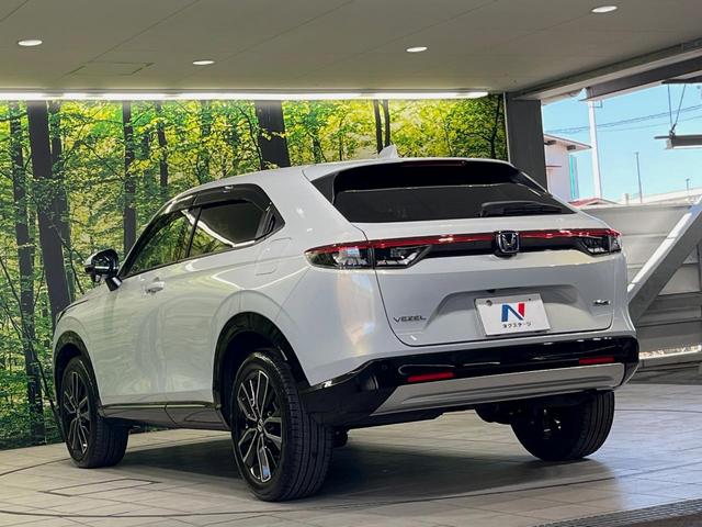 ヴェゼル ｅ：ＨＥＶ　Ｚ　メーカー９型ナビ　バックカメラ　衝突軽減装置　レーダークルーズ　禁煙車　パワーバックドア　シートヒーター　ハーフレザーシート　ドラレコ　コーナーセンサー　スマートキー　ＬＥＤヘッドライト　ＥＴＣ２．０（62枚目）