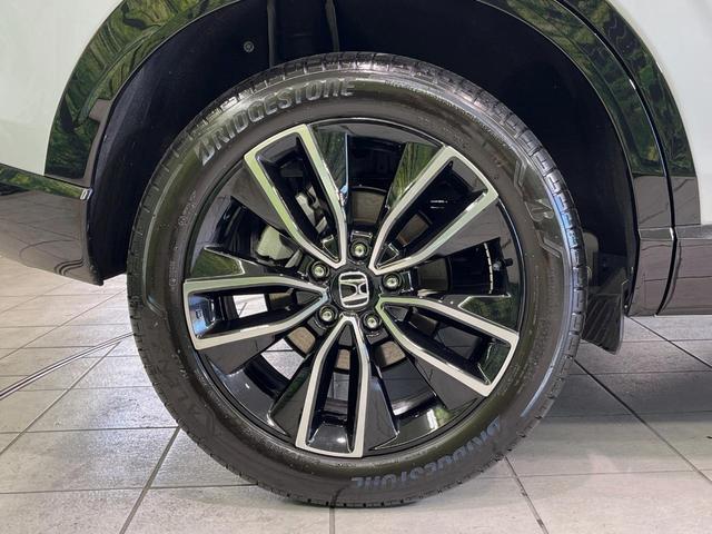 ヴェゼル ｅ：ＨＥＶ　Ｚ　メーカー９型ナビ　バックカメラ　衝突軽減装置　レーダークルーズ　禁煙車　パワーバックドア　シートヒーター　ハーフレザーシート　ドラレコ　コーナーセンサー　スマートキー　ＬＥＤヘッドライト　ＥＴＣ２．０（70枚目）