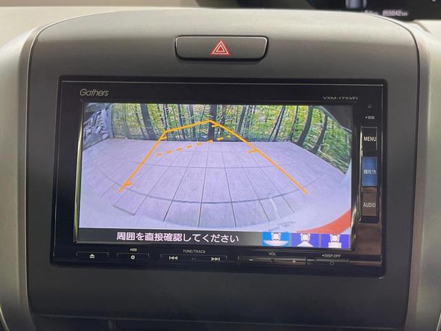 フリードハイブリッド ハイブリッド・ＥＸ　純正ＳＤナビ　バックカメラ　衝突軽減装置　アダプティブクルーズコントロール　ハーフレザーシート　ドラレコ　スマートキー　ＬＥＤヘッド　ＥＴＣ　純正１５インチアルミ　前席シートヒーター　禁煙車（4枚目）