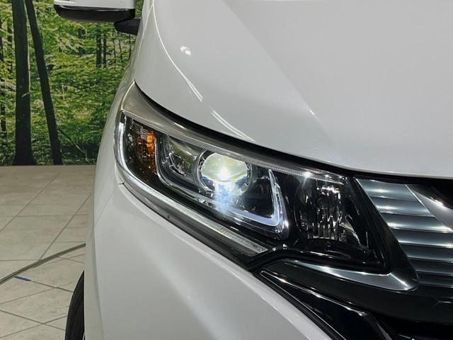 フリードハイブリッド ハイブリッド・ＥＸ　純正ＳＤナビ　バックカメラ　衝突軽減装置　アダプティブクルーズコントロール　ハーフレザーシート　ドラレコ　スマートキー　ＬＥＤヘッド　ＥＴＣ　純正１５インチアルミ　前席シートヒーター　禁煙車（13枚目）