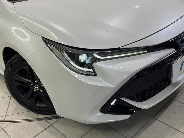 カローラスポーツ ハイブリッドG スタイル 50ミリオンエディション 純正9型ナビ バックカメラ 衝突軽減装置 レーダークルーズ 禁煙車 ハーフレザーシート コーナーセンサー スマートキー LEDヘッド ビルトインETC 純正16インチアルミ(12枚目)