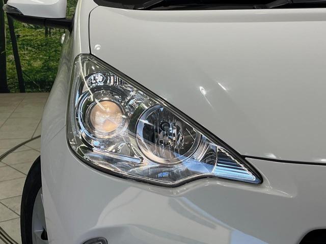 アクア Ｇ　８型ＢＩＧ－Ｘナビ　バックカメラ　禁煙車　スマートキー　ＥＴＣ　オートライト　オートエアコン　革巻きハンドル　電動格納ミラー　パワーウィンドウ　盗難防止装置　プライバシーガラス　横滑り防止装置（12枚目）