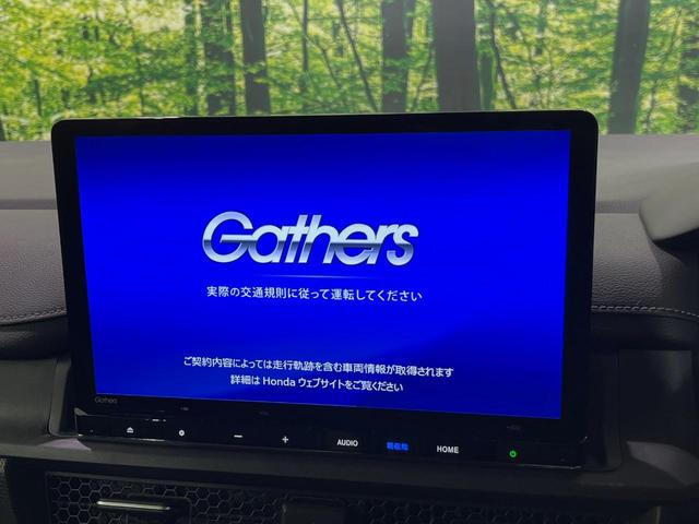 ステップワゴン ｅ：ＨＥＶスパーダ　純正１１型ナビ　バックカメラ　後席モニター　両側電動スライドドア　衝突軽減装置　禁煙車　パワーバックドア　シートヒーター　ハーフレザーシート　前後ドラレコ　コーナーセンサー　スマートキー　ＥＴＣ（3枚目）