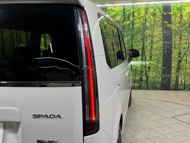 ステップワゴン ｅ：ＨＥＶスパーダ　純正１１型ナビ　バックカメラ　後席モニター　両側電動スライドドア　衝突軽減装置　禁煙車　パワーバックドア　シートヒーター　ハーフレザーシート　前後ドラレコ　コーナーセンサー　スマートキー　ＥＴＣ（64枚目）