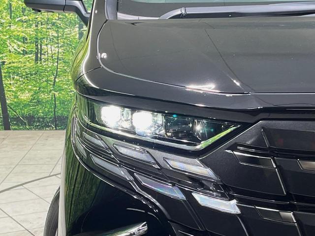 アルファードハイブリッド Z パノラマルーフ ユニバーサルステップ 純正14型ナビ 後席モニター 全周囲カメラ 両側電動スライドドア 100V電源 衝突軽減装置 ステアリングヒーター デジタルインナーミラー 置くだけ充電(68枚目)