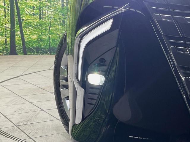 アルファードハイブリッド Z パノラマルーフ ユニバーサルステップ 純正14型ナビ 後席モニター 全周囲カメラ 両側電動スライドドア 100V電源 衝突軽減装置 ステアリングヒーター デジタルインナーミラー 置くだけ充電(69枚目)