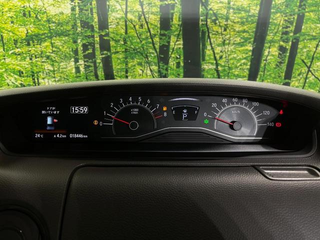 N-BOX G・Lホンダセンシング 純正ナビ バックカメラ 衝突軽減装置 両側電動スライドドア ドラレコ ETC LEDヘッド レーダークルーズ スマートキー 車線逸脱警報 オートライト オートエアコン ステアリングスイッチ 禁煙車(27枚目)
