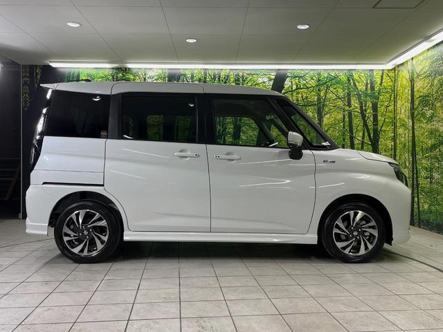 ソリオバンディット ハイブリッドＭＶ　登録済未使用車　メーカー９型ナビ　両側電動ドア　全周囲カメラ　衝突被害軽減システム　レーダークルーズ　コーナーセンサー　スマートキー　ＬＥＤヘッド　純正１５インチアルミ　オートハイビーム　車線逸脱警報（23枚目）