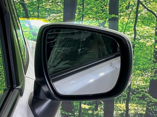 ソリオバンディット ハイブリッドＭＶ　登録済未使用車　メーカー９型ナビ　両側電動ドア　全周囲カメラ　衝突被害軽減システム　レーダークルーズ　コーナーセンサー　スマートキー　ＬＥＤヘッド　純正１５インチアルミ　オートハイビーム　車線逸脱警報（26枚目）