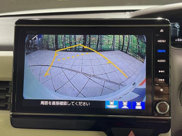 Ｎ－ＢＯＸ Ｇ・Ｌホンダセンシング　純正８型ナビ　電動スライドドア　バックカメラ　衝突被害軽減システム　禁煙車　ドラレコ　コーナーセンサー　スマートキー　ＬＥＤヘッド　ビルトインＥＴＣ　オートハイビーム　車線逸脱警報　オートライト（4枚目）