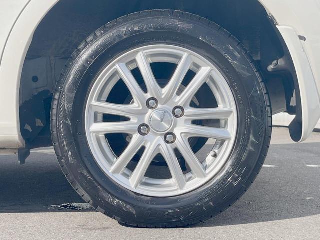 フィット Ｇ・１０ｔｈアニバーサリー　ＣＤ再生オーディオ　ＥＴＣ　スマートキー　アイドリングストップ機能　電動格納ドアミラー　エアコン　パワーウィンドウ　１４インチアルミホイール　プライバシーガラス　運転席シートリフター（32枚目）