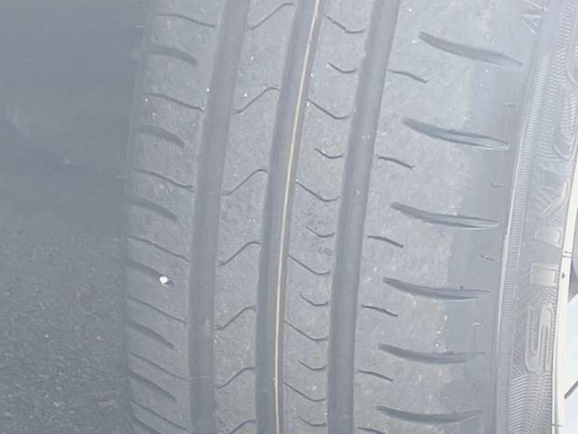 フィット Ｇ・１０ｔｈアニバーサリー　ＣＤ再生オーディオ　ＥＴＣ　スマートキー　アイドリングストップ機能　電動格納ドアミラー　エアコン　パワーウィンドウ　１４インチアルミホイール　プライバシーガラス　運転席シートリフター（35枚目）