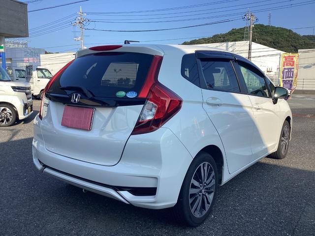フィット 13G・L ホンダセンシング ワンオーナー 禁煙車 ナビ フルセグTV CD DVD バックモニター LEDヘッドライト ETC 純正アルミホイール キー2個 スタッドス&ホイール(3枚目)