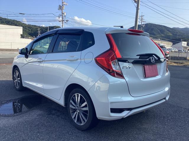 フィット 13G・L ホンダセンシング ワンオーナー 禁煙車 ナビ フルセグTV CD DVD バックモニター LEDヘッドライト ETC 純正アルミホイール キー2個 スタッドス&ホイール(5枚目)