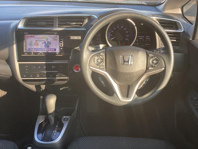 フィット 13G・L ホンダセンシング ワンオーナー 禁煙車 ナビ フルセグTV CD DVD バックモニター LEDヘッドライト ETC 純正アルミホイール キー2個 スタッドス&ホイール(11枚目)