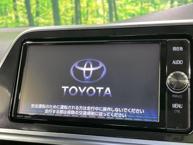 ハイブリッドG クエロ 禁煙車 純正SDナビ フリップダウンモニター 両側電動ドア ハーフレザー LEDヘッド バックカメラ ETC Bluetooth再生 純正16インチアルミ スマートキー 7人乗り(4枚目)