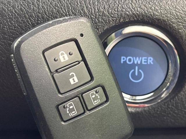 ハイブリッドG クエロ 禁煙車 純正SDナビ フリップダウンモニター 両側電動ドア ハーフレザー LEDヘッド バックカメラ ETC Bluetooth再生 純正16インチアルミ スマートキー 7人乗り(10枚目)