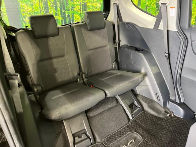 ハイブリッドG クエロ 禁煙車 純正SDナビ フリップダウンモニター 両側電動ドア ハーフレザー LEDヘッド バックカメラ ETC Bluetooth再生 純正16インチアルミ スマートキー 7人乗り(13枚目)