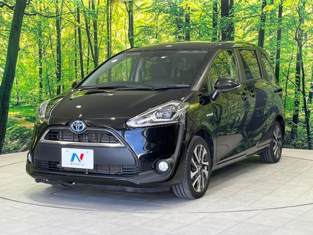 ハイブリッドG クエロ 禁煙車 純正SDナビ フリップダウンモニター 両側電動ドア ハーフレザー LEDヘッド バックカメラ ETC Bluetooth再生 純正16インチアルミ スマートキー 7人乗り(18枚目)