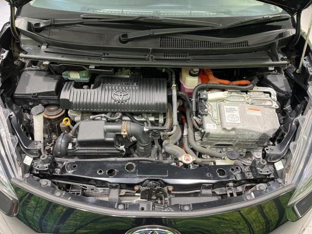 ハイブリッドG クエロ 禁煙車 純正SDナビ フリップダウンモニター 両側電動ドア ハーフレザー LEDヘッド バックカメラ ETC Bluetooth再生 純正16インチアルミ スマートキー 7人乗り(19枚目)