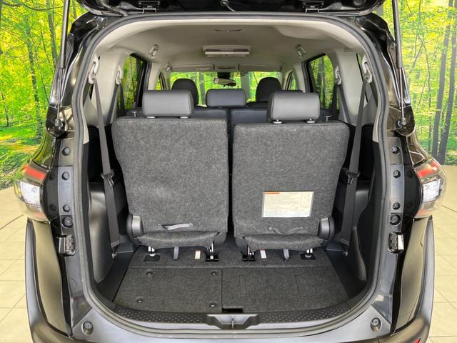 ハイブリッドG クエロ 禁煙車 純正SDナビ フリップダウンモニター 両側電動ドア ハーフレザー LEDヘッド バックカメラ ETC Bluetooth再生 純正16インチアルミ スマートキー 7人乗り(22枚目)