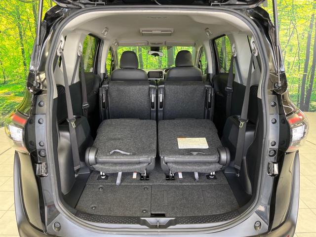 ハイブリッドG クエロ 禁煙車 純正SDナビ フリップダウンモニター 両側電動ドア ハーフレザー LEDヘッド バックカメラ ETC Bluetooth再生 純正16インチアルミ スマートキー 7人乗り(23枚目)
