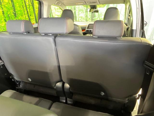 ハイブリッドG クエロ 禁煙車 純正SDナビ フリップダウンモニター 両側電動ドア ハーフレザー LEDヘッド バックカメラ ETC Bluetooth再生 純正16インチアルミ スマートキー 7人乗り(25枚目)