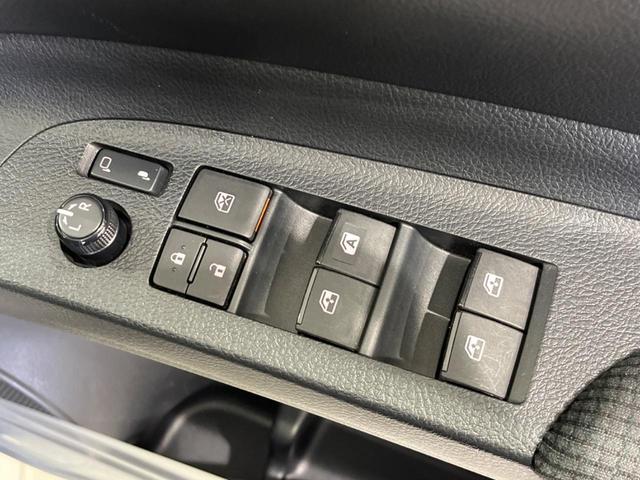 ハイブリッドG クエロ 禁煙車 純正SDナビ フリップダウンモニター 両側電動ドア ハーフレザー LEDヘッド バックカメラ ETC Bluetooth再生 純正16インチアルミ スマートキー 7人乗り(32枚目)