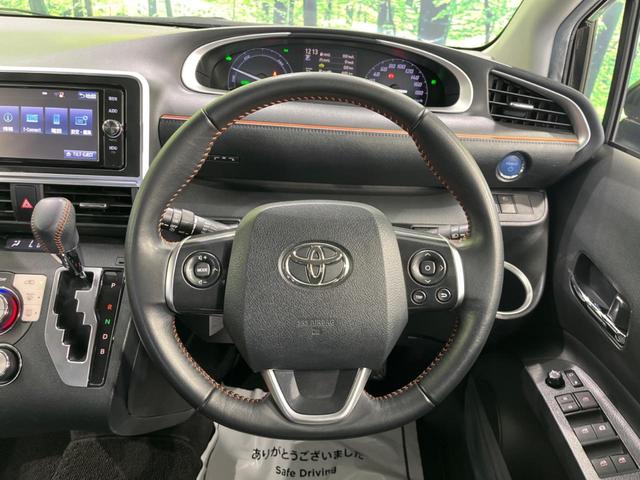 ハイブリッドG クエロ 禁煙車 純正SDナビ フリップダウンモニター 両側電動ドア ハーフレザー LEDヘッド バックカメラ ETC Bluetooth再生 純正16インチアルミ スマートキー 7人乗り(34枚目)