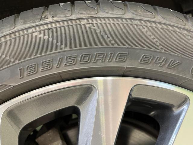 ハイブリッドG クエロ 禁煙車 純正SDナビ フリップダウンモニター 両側電動ドア ハーフレザー LEDヘッド バックカメラ ETC Bluetooth再生 純正16インチアルミ スマートキー 7人乗り(52枚目)