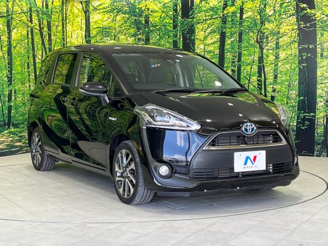 ハイブリッドG クエロ 禁煙車 純正SDナビ フリップダウンモニター 両側電動ドア ハーフレザー LEDヘッド バックカメラ ETC Bluetooth再生 純正16インチアルミ スマートキー 7人乗り(53枚目)