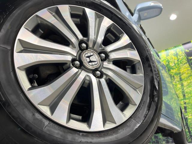 フリード G ジャストセレクション 電動スライドドア 純正SDナビ バックカメラ 禁煙車 スマートキー HIDヘッド ETC オートエアコン Bluetooth接続 CD DVD再生 地デジ(13枚目)