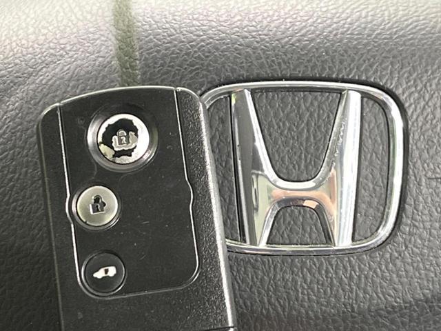 フリード G ジャストセレクション 電動スライドドア 純正SDナビ バックカメラ 禁煙車 スマートキー HIDヘッド ETC オートエアコン Bluetooth接続 CD DVD再生 地デジ(38枚目)