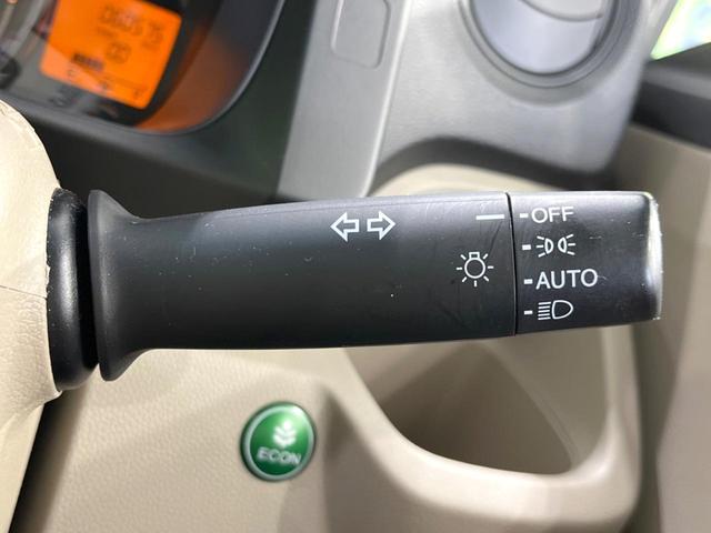 N-WGN G・Aパッケージ 衝突被害軽減システム 禁煙車 スマートキー HIDヘッド ビルトインETC オートライト オートエアコン CD 電動格納ミラー 盗難防止措置 プライバシーガラス ドアバイザー(6枚目)