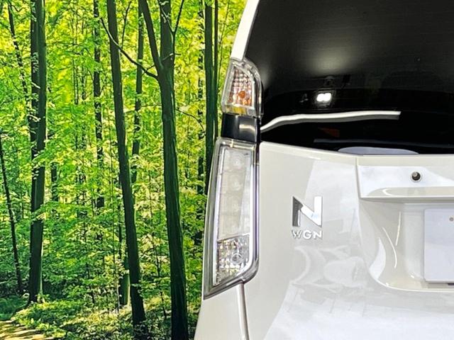 N-WGN G・Aパッケージ 衝突被害軽減システム 禁煙車 スマートキー HIDヘッド ビルトインETC オートライト オートエアコン CD 電動格納ミラー 盗難防止措置 プライバシーガラス ドアバイザー(31枚目)