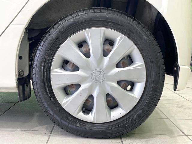 N-WGN G・Aパッケージ 衝突被害軽減システム 禁煙車 スマートキー HIDヘッド ビルトインETC オートライト オートエアコン CD 電動格納ミラー 盗難防止措置 プライバシーガラス ドアバイザー(49枚目)