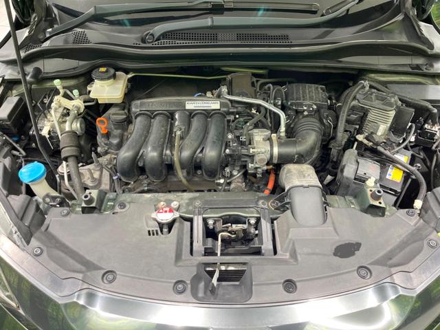 ヴェゼル ハイブリッドZ 純正ナビ バックカメラ 衝突被害軽減システム 禁煙車 コーナーセンサー LEDヘッド ビルトインETC クルコン 車線逸脱警報 オートライト デュアルエアコン 純正17インチアルミ CD(18枚目)