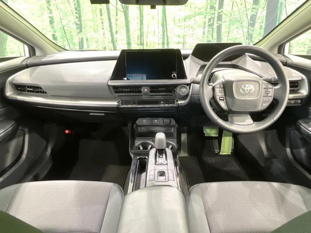 プリウス Ｘ　バックカメラ　衝突被害軽減システム　レーダークルーズ　禁煙車　ドラレコ　コーナーセンサー　スマートキー　ＬＥＤヘッド　ＥＴＣ２．０　オートハイビーム　車線逸脱警報　オートライト　オートエアコン（2枚目）