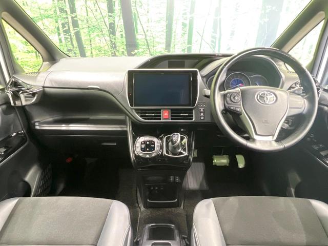 ノア ハイブリッドＳｉ　ダブルバイビーＩＩＩ　両側電動ドア　純正１０型ナビ　後席モニター　バックカメラ　衝突被害軽減システム　禁煙車　ハーフレザーシート　ドラレコ　コーナーセンサー　ＬＥＤヘッド　ビルトインＥＴＣ　クルコン　純正１６インチアルミ（2枚目）