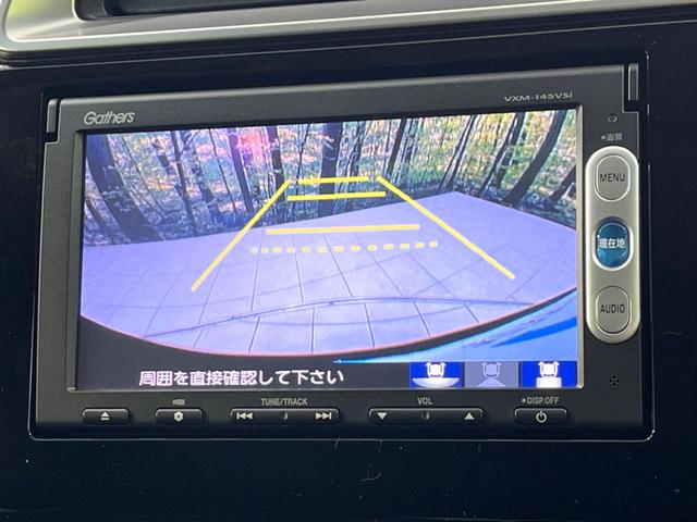 フィットハイブリッド Lパッケージ 4WD 純正SDナビ バックカメラ 禁煙車 ハーフレザーシート ドラレコ スマートキー LEDヘッド ビルトインETC クルコン 純正15インチアルミ オートライト オートエアコン(4枚目)