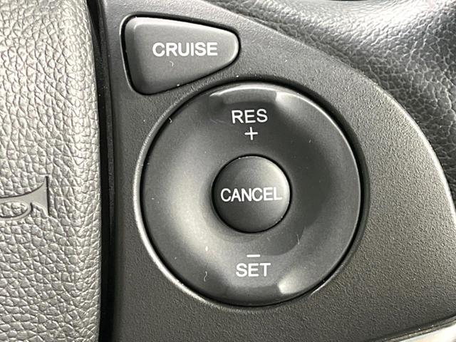 フィットハイブリッド Lパッケージ 4WD 純正SDナビ バックカメラ 禁煙車 ハーフレザーシート ドラレコ スマートキー LEDヘッド ビルトインETC クルコン 純正15インチアルミ オートライト オートエアコン(7枚目)