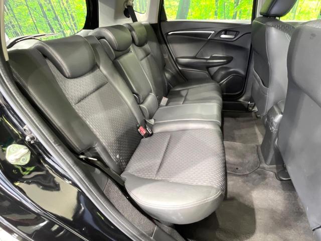 フィットハイブリッド Lパッケージ 4WD 純正SDナビ バックカメラ 禁煙車 ハーフレザーシート ドラレコ スマートキー LEDヘッド ビルトインETC クルコン 純正15インチアルミ オートライト オートエアコン(9枚目)