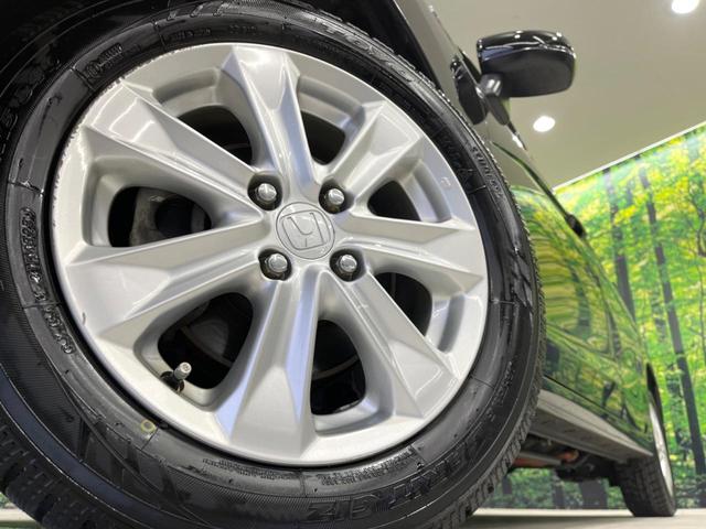 フィットハイブリッド Lパッケージ 4WD 純正SDナビ バックカメラ 禁煙車 ハーフレザーシート ドラレコ スマートキー LEDヘッド ビルトインETC クルコン 純正15インチアルミ オートライト オートエアコン(13枚目)